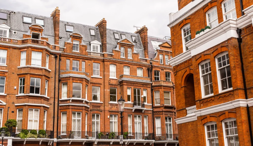 Homeowner weighing options between one or two Party Wall Surveyors Wimbledon