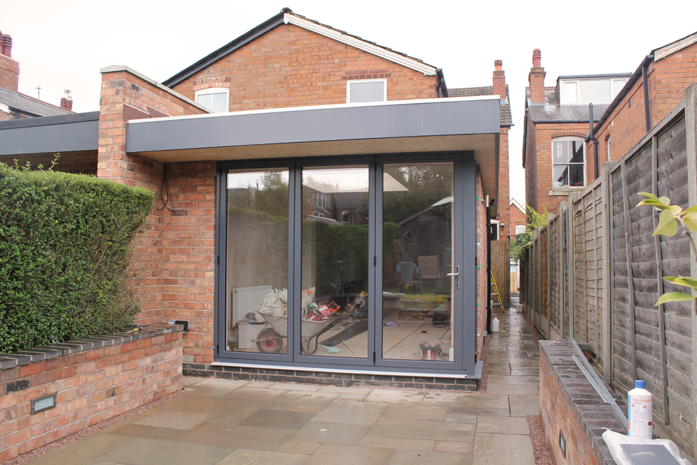 Surveyor inspecting steel beam Wimbledon installation on site